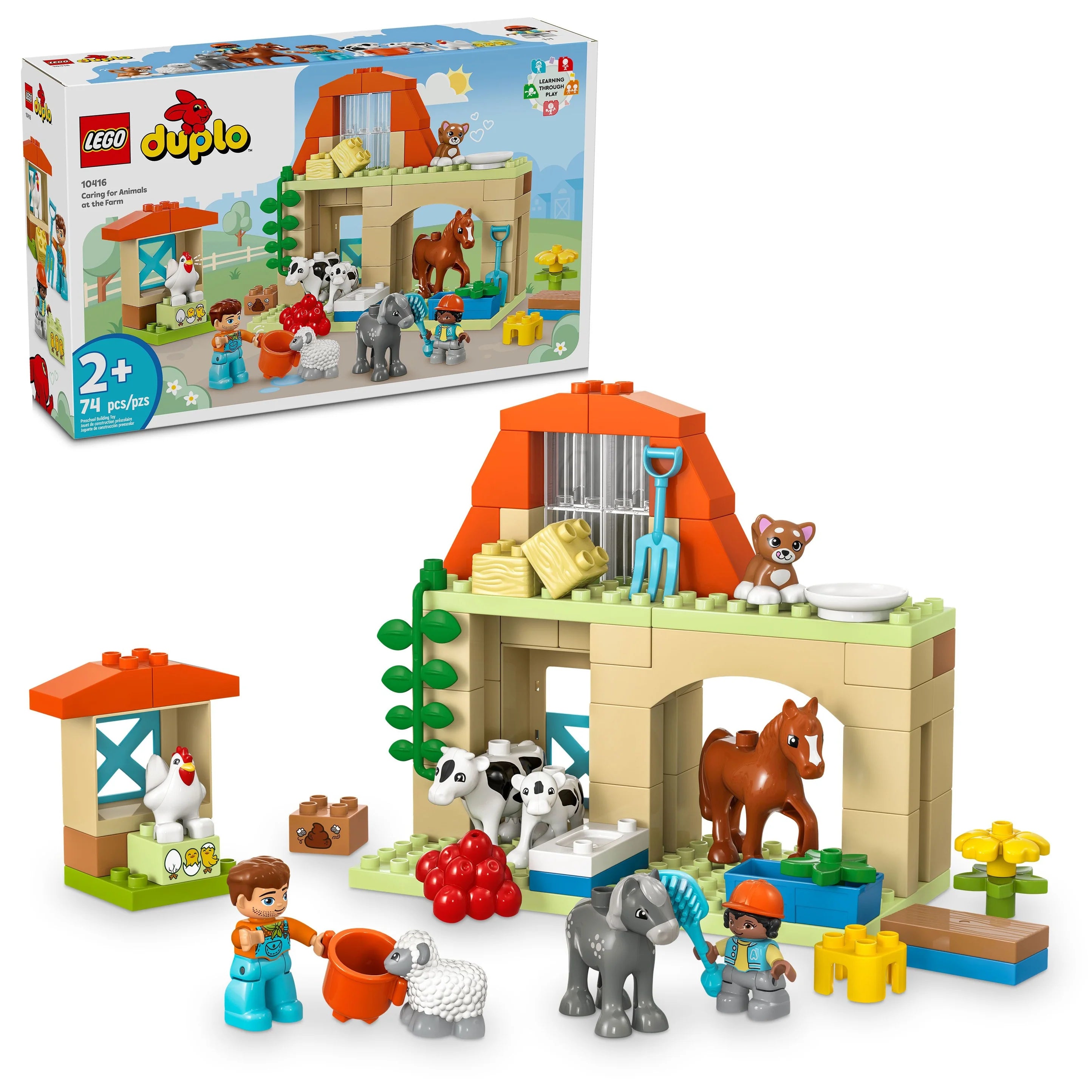 LEGO DUPLO Town set depicting a farm scene with various animal figures, such as a cow, pig, and horse, along with two DUPLO figures playing as caretakers.
